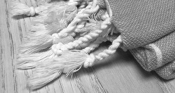 Turkish Towel Tassel Styles - Comparison of Twisted Knots, Single Knot Tassels, Fringe and Sewn Pom Poms - Rivieratowel