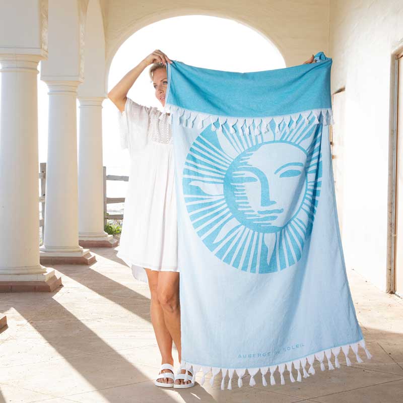 Jacquard-woven Turkish towel with branded pattern